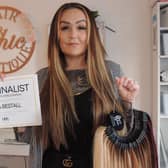 Hair and beauty salon owner Emma Bestall pictured with the tools of her trade and confirmation she is a shortlisted finalist in the Hair and Beauty Awards. EMN-220121-163213001