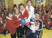 Pictured with Kieran Tscherniawsky at Kirkby la Thorpe Primary School are (from left) Brett-Lee Olson, 11, Olivia Mawditt, 10, Beth Moss, 10, and headteacher Katie Bartle.