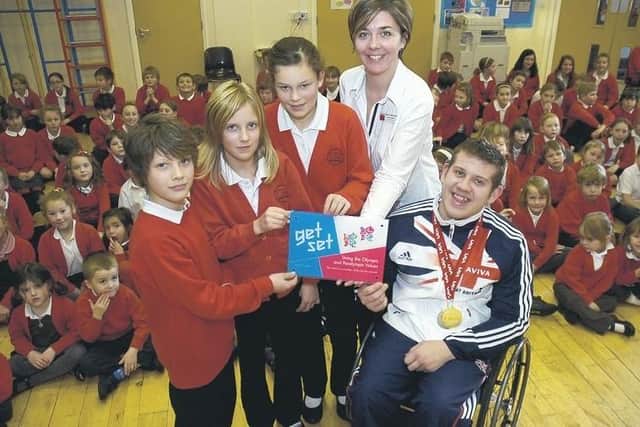 Pictured with Kieran Tscherniawsky at Kirkby la Thorpe Primary School are (from left) Brett-Lee Olson, 11, Olivia Mawditt, 10, Beth Moss, 10, and headteacher Katie Bartle.