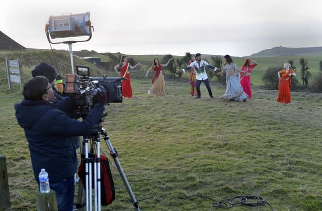 Filming at Beachy Head (Photo by Jon Rigby) SUS-220118-233312008