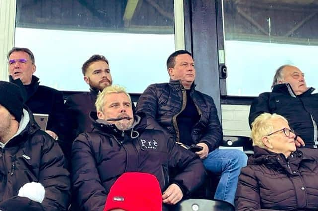 Paul Cox watches on at Spennymoor, joined by his Kettering assistant John Ramshaw and coach Ben Marvin, who are expected to follow him to Boston.