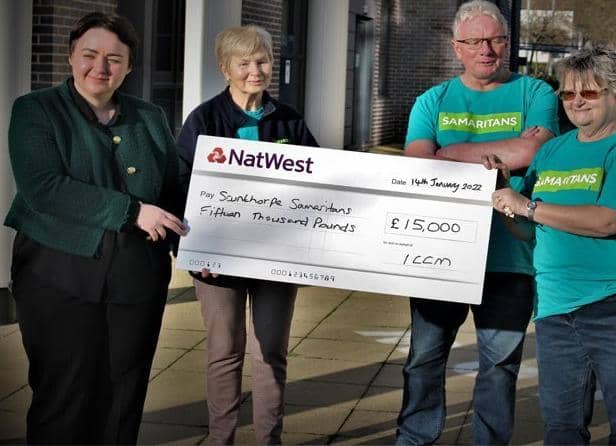 Scunthorpe MP, Holly Mumby-Croft presenting a cheque to Scunthorpe Samaritans volunteers.
Photo by Keith Dawson. EMN-220124-084834001