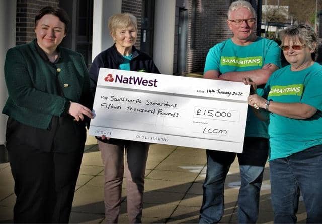 Scunthorpe MP, Holly Mumby-Croft presenting a cheque to Scunthorpe Samaritans volunteers.
Photo by Keith Dawson. EMN-220124-084834001