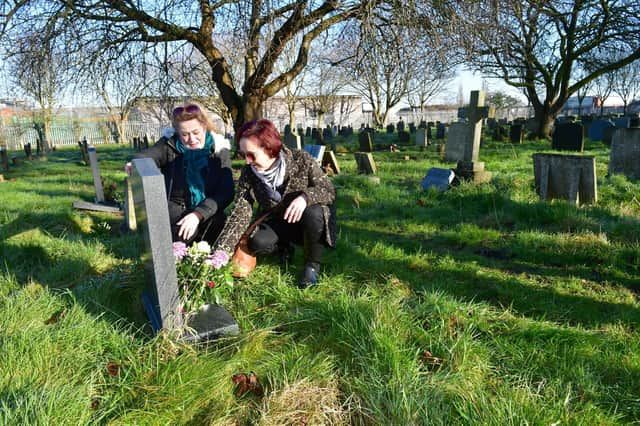 Pamela Ellis and Julie Gray in St Clement's Churchyard.