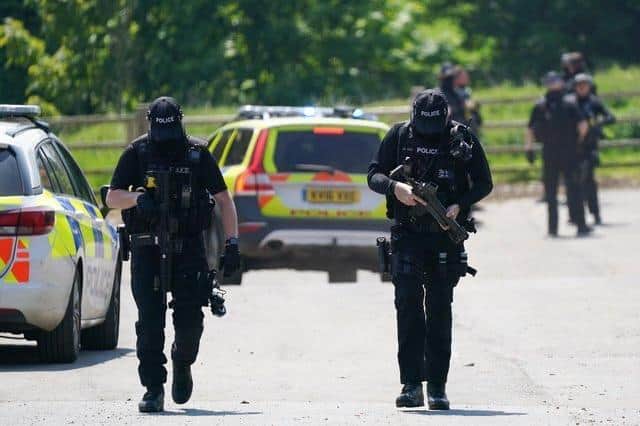 Police at the scene of Boulton's arrest near Louth.