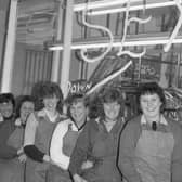 Staff at John Swain's outside the shop in Boston Market Place in 1987.