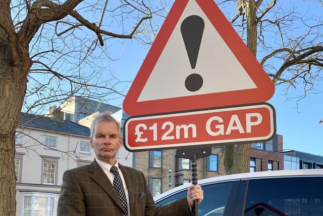 LCC leader Coun Martin Hill promoting the authority's 'Fix Our Funds To Fix Our Roads' campaign..