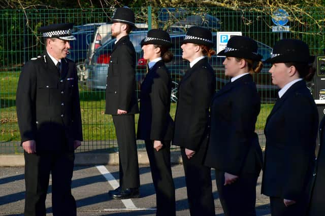 Chief Constable Chris Haward congratulates the new recruits.