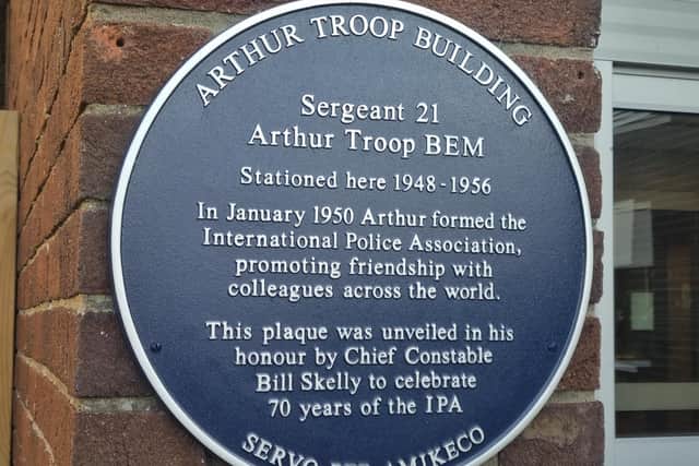 A plaque outside the new Lincolnshire Police training centre in Skegness celebrating the 70th anniversary of The International Police Association and its association with founder Arthur Troop, who served as a sergeant in Skegness from 1948  - 1956. The new centre is named after him.