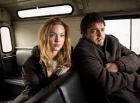 Robin Ellacott (Holliday Grainger) and Cormoran Strike (Tom Burke) in the new ITV crime drama Strike.