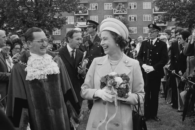 Queen Elizabeth II in Deptford, during a walkabout to commemorate her Silver Jubilee in 1977  (photo: Evening Standard/Hulton Archive/Getty Images)