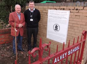 Coun Anthony Brand and William Alvey School headteacher Stephen Tapley planting the mulberry tree. EMN-220702-175650001