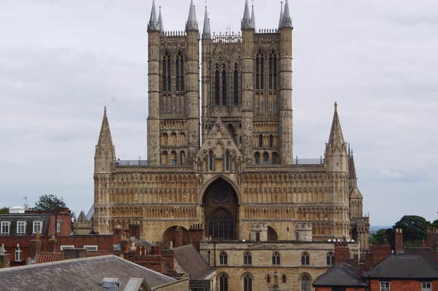 One of the most well-known visitor attractions in the county - Lincoln Cathedral's West front from the Castle walls EMN-181202-115418001