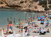 IBIZA: Tourists enjoy a sunny day at Cala Tadira beach. Photo: Getty Images