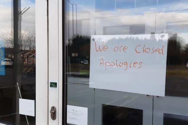The note on the entrance to truGym, in Boston.