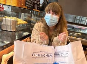 Care home coordinator Cheryl Curtis goes to local shop to buy fish and chips and comes away with five bags in total.