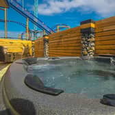 Relax in a hot tub in your own private garden.