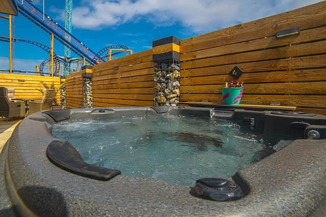 Relax in a hot tub in your own private garden.