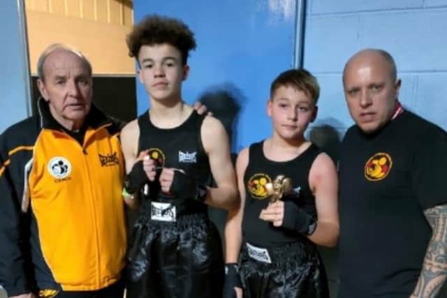 Boxers Jared Wiltshire and Freddie Carman pictured with coaches Rod and Mark Crozier.
