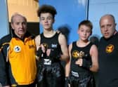 Boxers Jared Wiltshire and Freddie Carman pictured with coaches Rod and Mark Crozier.