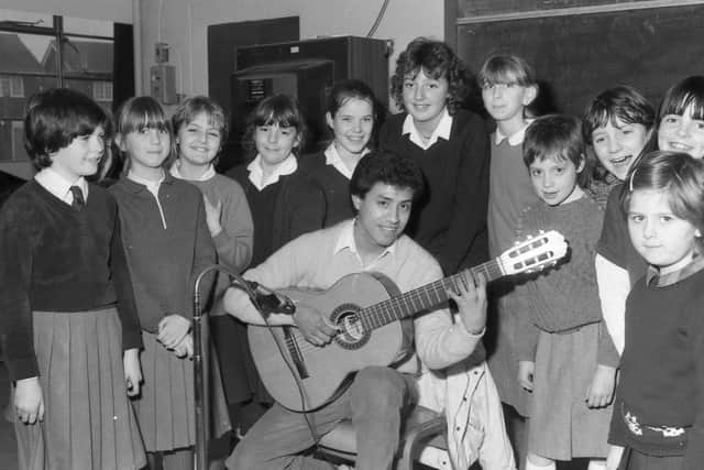 One with Swineshead schoolchildren in 1987.