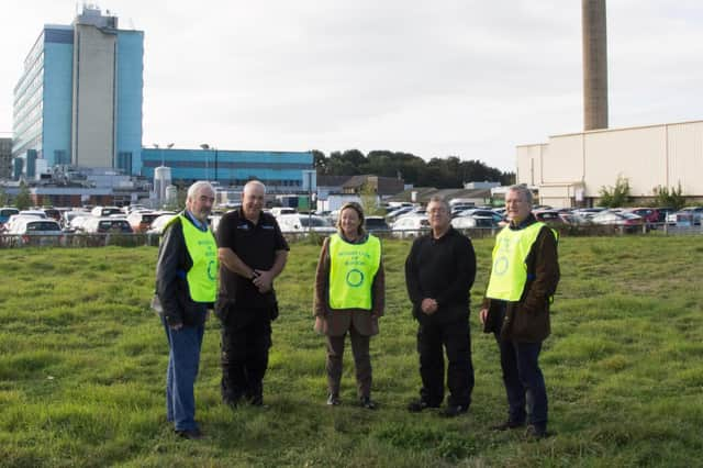 Members of the Rotary Club of Boston pictured at the helipad site last October, when they first launched their crowdfunding appeal for the lights.