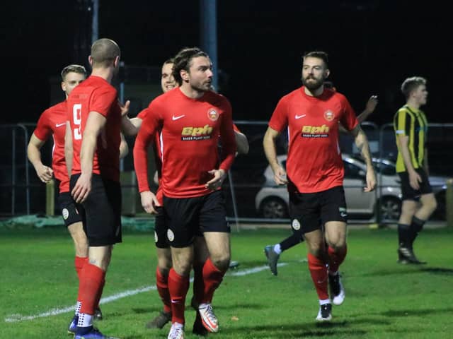 Ward, right, enjoys hearing from his senior players. Photo: Oliver Atkin