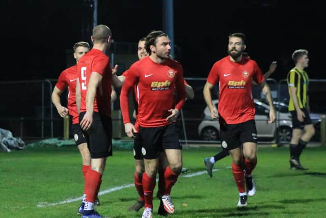 Ward, right, enjoys hearing from his senior players. Photo: Oliver Atkin
