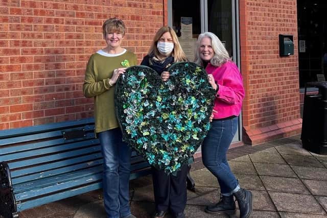 Organisers Sue Baker and Linda Forman with library manager Karen waring