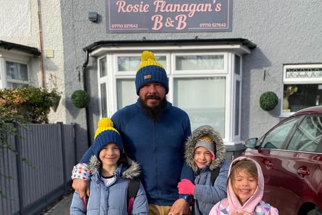 Chris with his daughters Elsa, Nala and Aria outside Rosie Flanagan's guest house in Skegness.