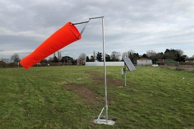 The new illuminated windsock and solar panel at the helipad site.