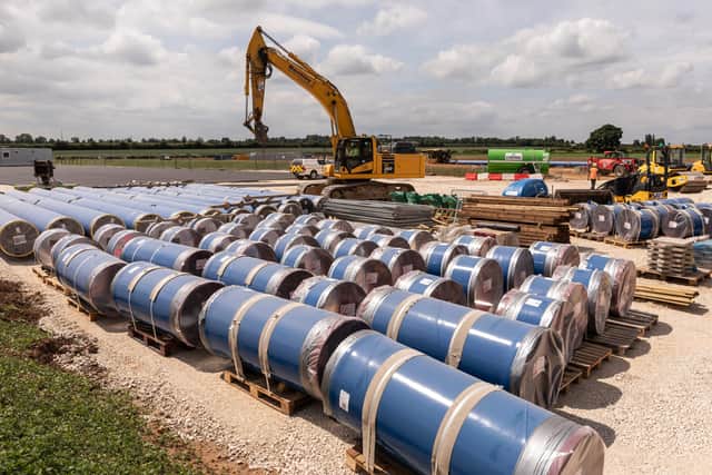 Working on the new pipeline installation near Harmston. EMN-220215-102729001