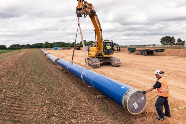 Anglian Water teams working on the new pipeline installation near Harmston. EMN-220215-102948001