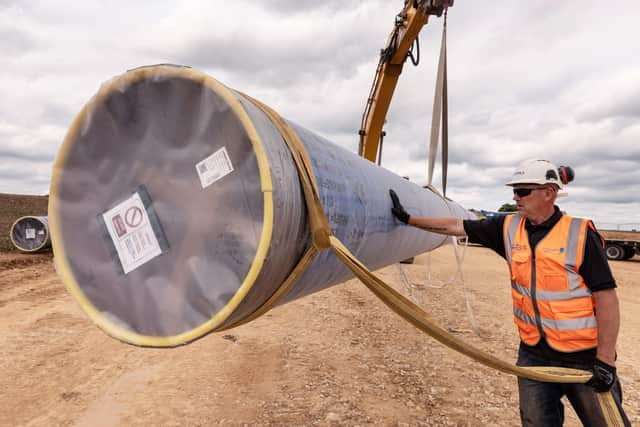 Anglian Water teams working on the new pipeline installation near Harmston. EMN-220215-102824001