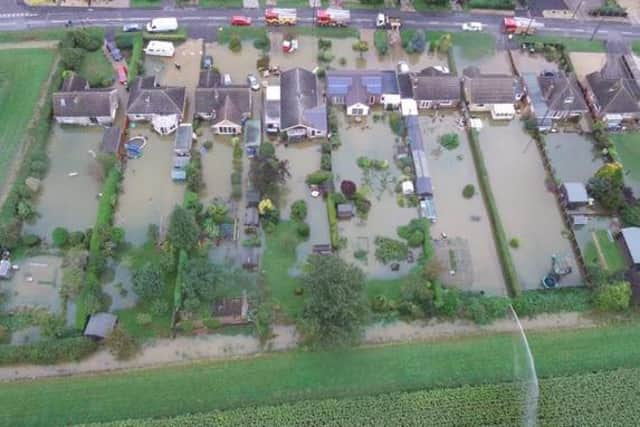 Flooding of bungalows in Ruskington in 2019. EMN-220215-113729001