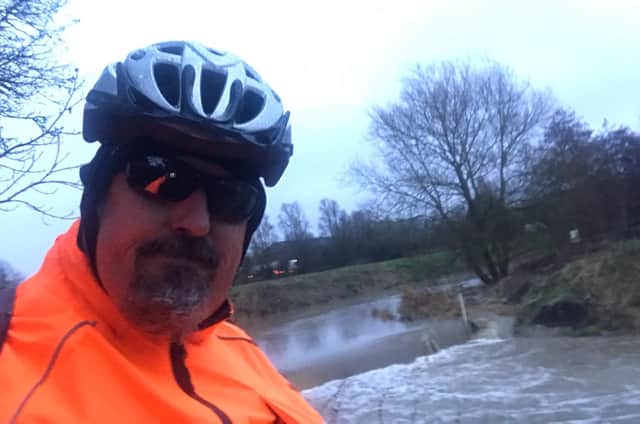 Horncastle PCSO Nigel Wass said it was a wet ride in to work at the police office this morning. Photo: Nigel Wass