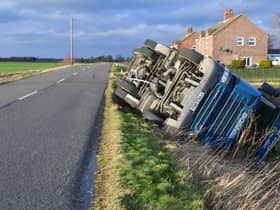 Overturned lorry at South Kyme in the high winds of Storm Eunice. EMN-220218-181814001