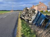 Overturned lorry at South Kyme in the high winds of Storm Eunice. EMN-220218-181814001