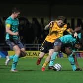 Jordan Preston battles for the ball when United drew 2-2 with Chorley in November. Photo: Oliver Atkin