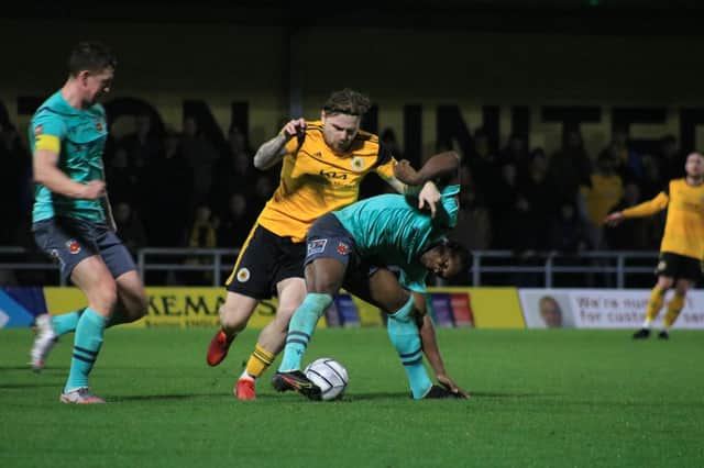 Jordan Preston battles for the ball when United drew 2-2 with Chorley in November. Photo: Oliver Atkin