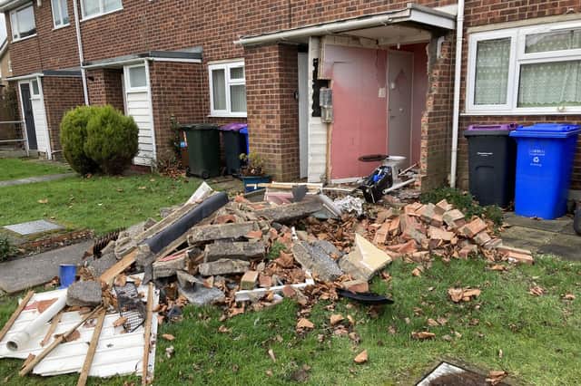 The exposed toilet at the property in Peck Avenue following the crash.