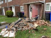 The exposed toilet at the property in Peck Avenue following the crash.