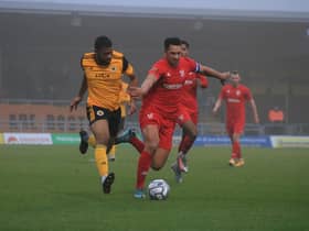 Keenan Ferguson bursts forward during United's 4-1 win over Kidderminster in the FA Trophy. Photo: Oliver Atkin