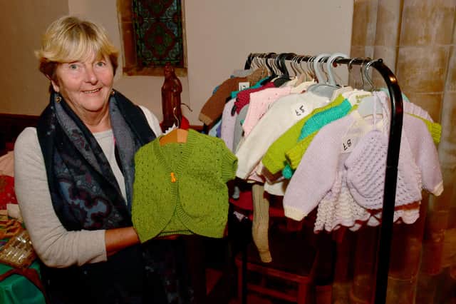 June Bullock of Belchford with her knitted chidrens clothes EMN-220222-125812001