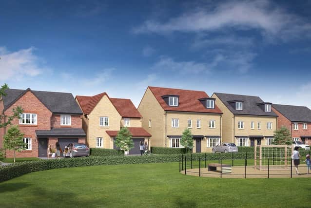 An impression of some of the Keepmoat Homes, overlooking a children's open space. EMN-220222-164851001