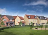 An impression of some of the Keepmoat Homes, overlooking a children's open space. EMN-220222-164851001