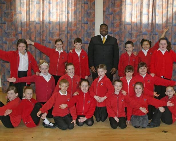 Skegness Junior School pupils with Michael Williams of The Drifters.