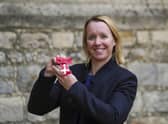 Melanie Marshall collects MBE at Windsor Castle. Photo: PA Wire