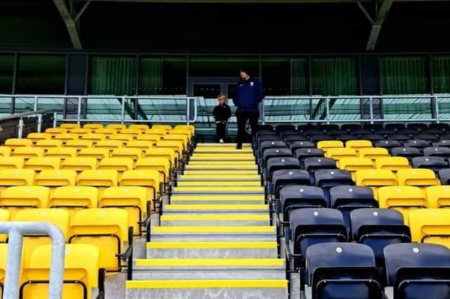 Clark and son Dixon at the Jakemans Community Stadium.