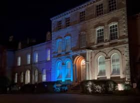 The NKDC offices were lit in blue and yellow in support of Ukraine on Thursday evening.